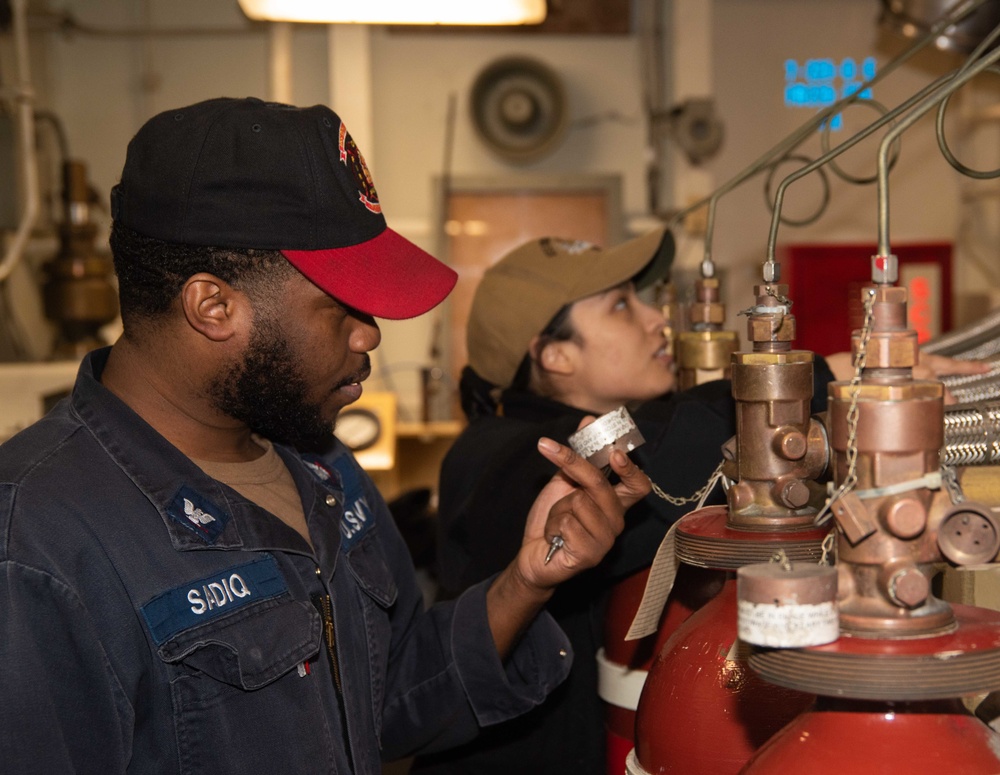 USS Ronald Reagan (CVN 76) DC Sailors conduct maintenance