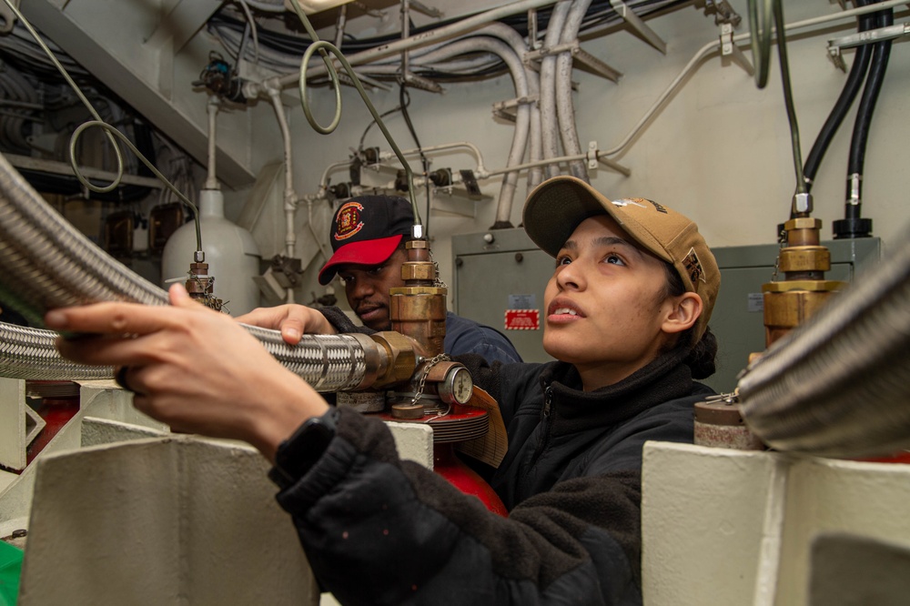 USS Ronald Reagan (CVN 76) DC Sailors conduct maintenance