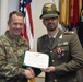 Commanding General Maj. Gen. Todd R. Wasmund presents Italian army Maj. Marco Nardi with the Meritorious Service Medal