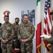 Commanding General Maj. Gen. Todd R. Wasmund presents Italian army Maj. Marco Nardi with the Meritorious Service Medal