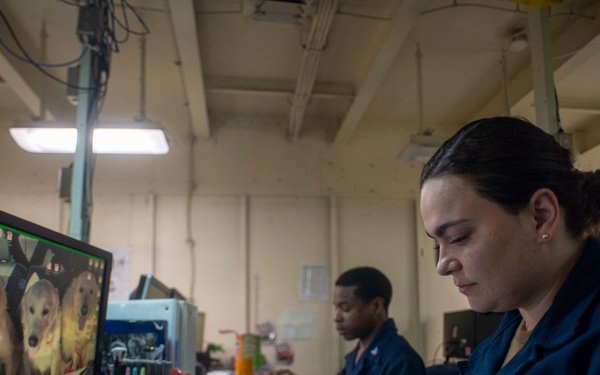 U.S. Navy Sailor Processes New Check-Ins