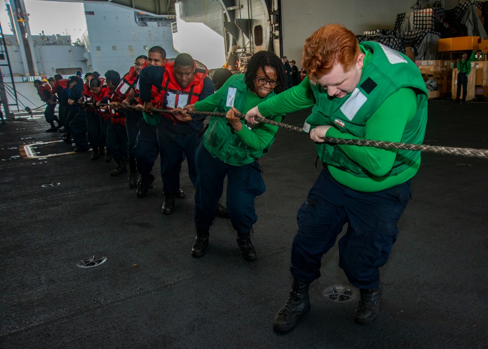 Sailors Heave Into Line