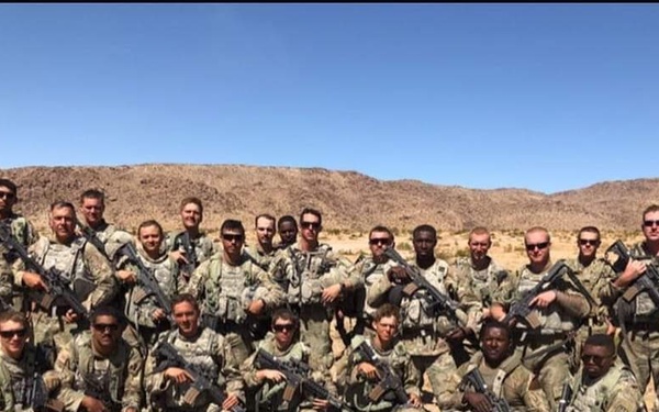 First Line Leaders Surround Soldier During Difficult Times