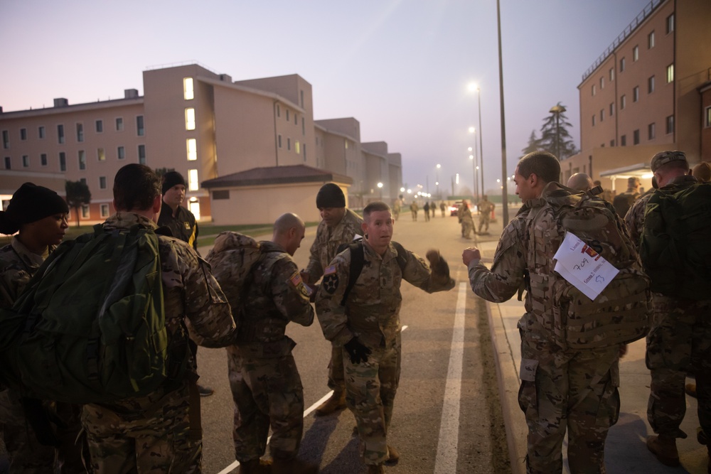 Soldiers assigned to U.S. Army Southern European Task Force, Africa (SETAF-AF), participate in a 5k ruck march during the Lions Legacy