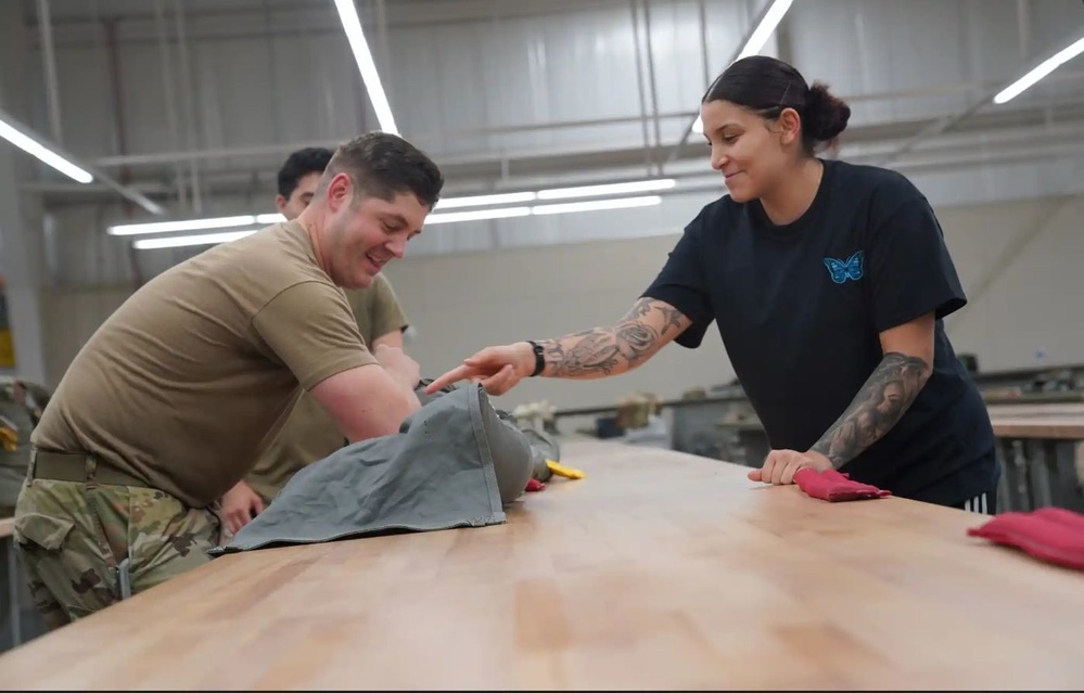 528th Special Troops Battalion and HHC Command Team learn how to pack chutes