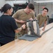 528th Special Troops Battalion and HHC Command Team learn how to pack chutes