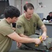 528th Special Troops Battalion and HHC Command Team learn how to pack chutes