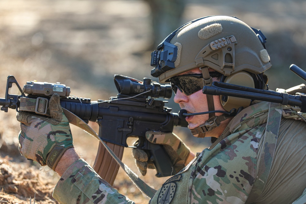 Advisors from 2nd Security Force Assistance Brigade practice react to contact battle drill