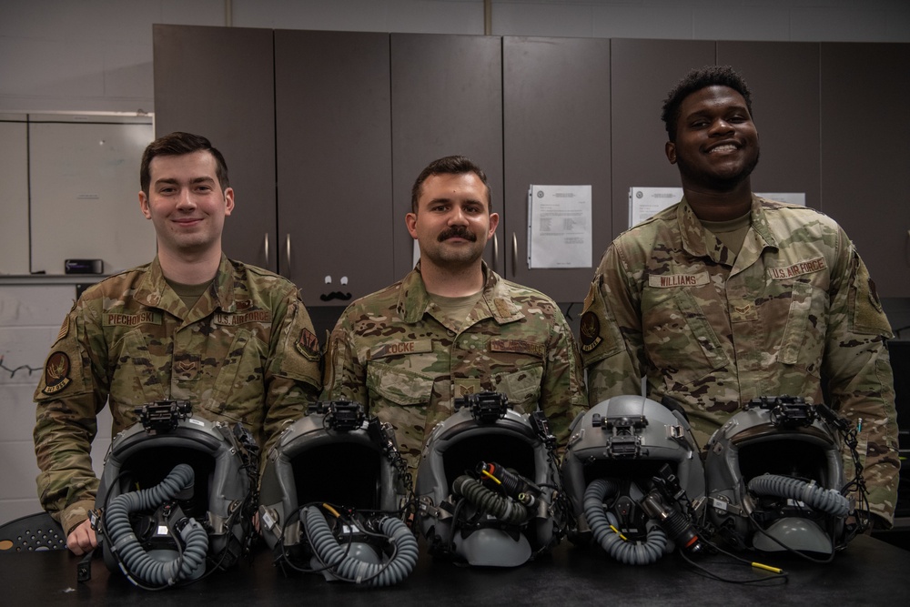 AFE Airmen inspect HGU-55/P helmets