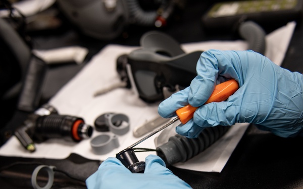 AFE Airmen inspect HGU-55/P helmets