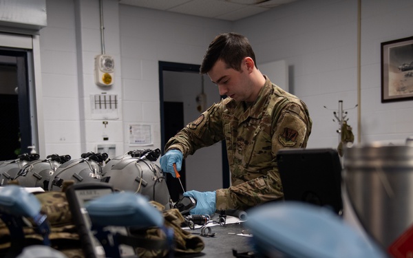 AFE Airmen inspect HGU-55/P helmets