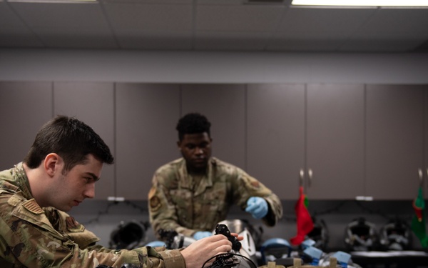 AFE Airmen inspect HGU-55/P helmets