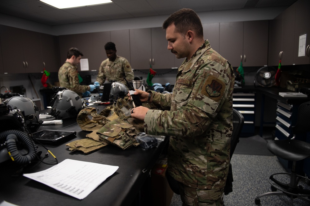 AFE Airmen inspect HGU-55/P helmets