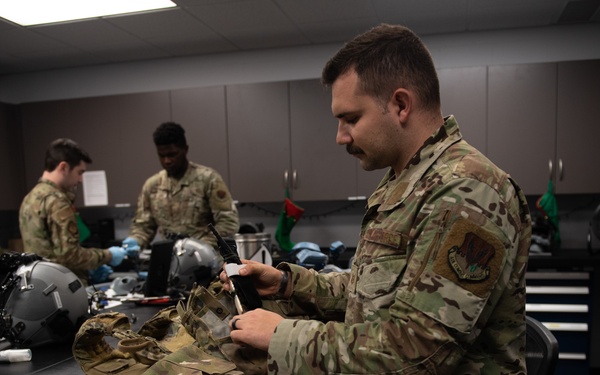 AFE Airmen inspect HGU-55/P helmets