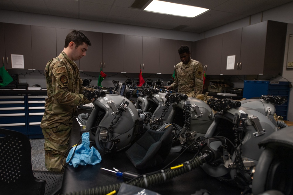 AFE Airmen inspect HGU-55/P helmets