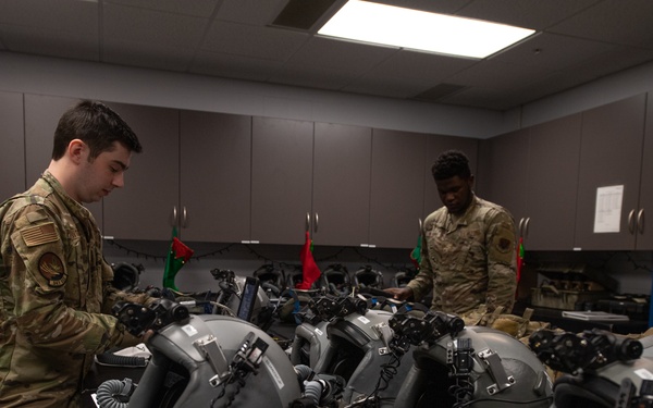 AFE Airmen inspect HGU-55/P helmets