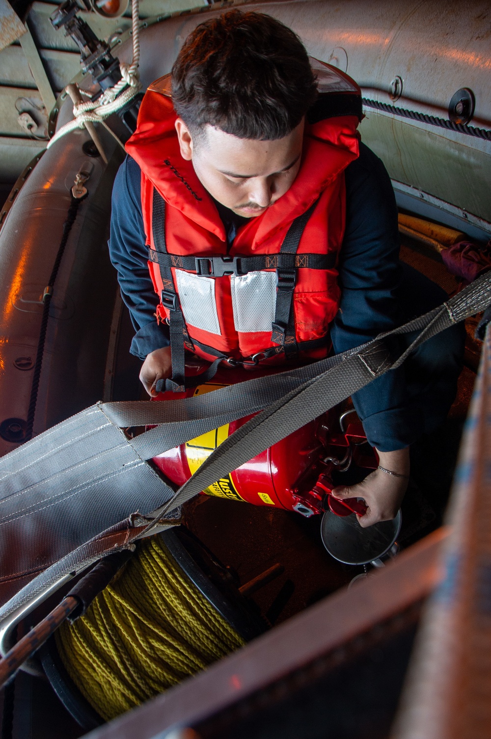 Sailor Refuels A RHIB