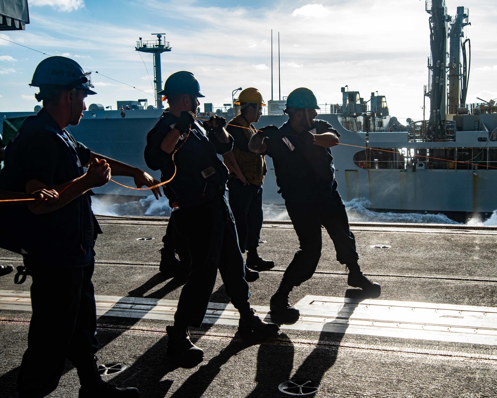 Sailors Heave Around Line