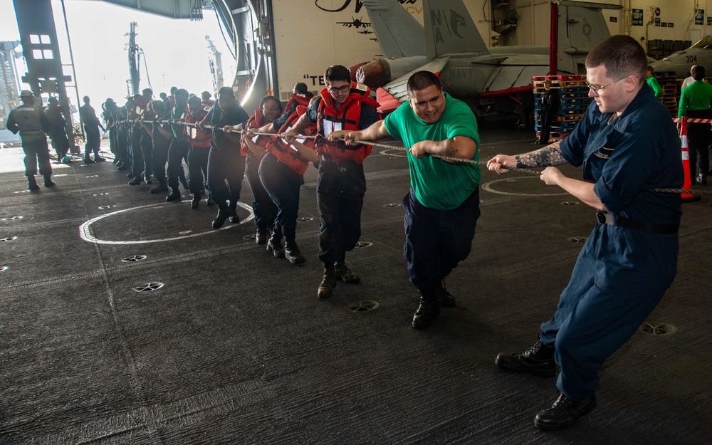 Sailors Heave Around Line