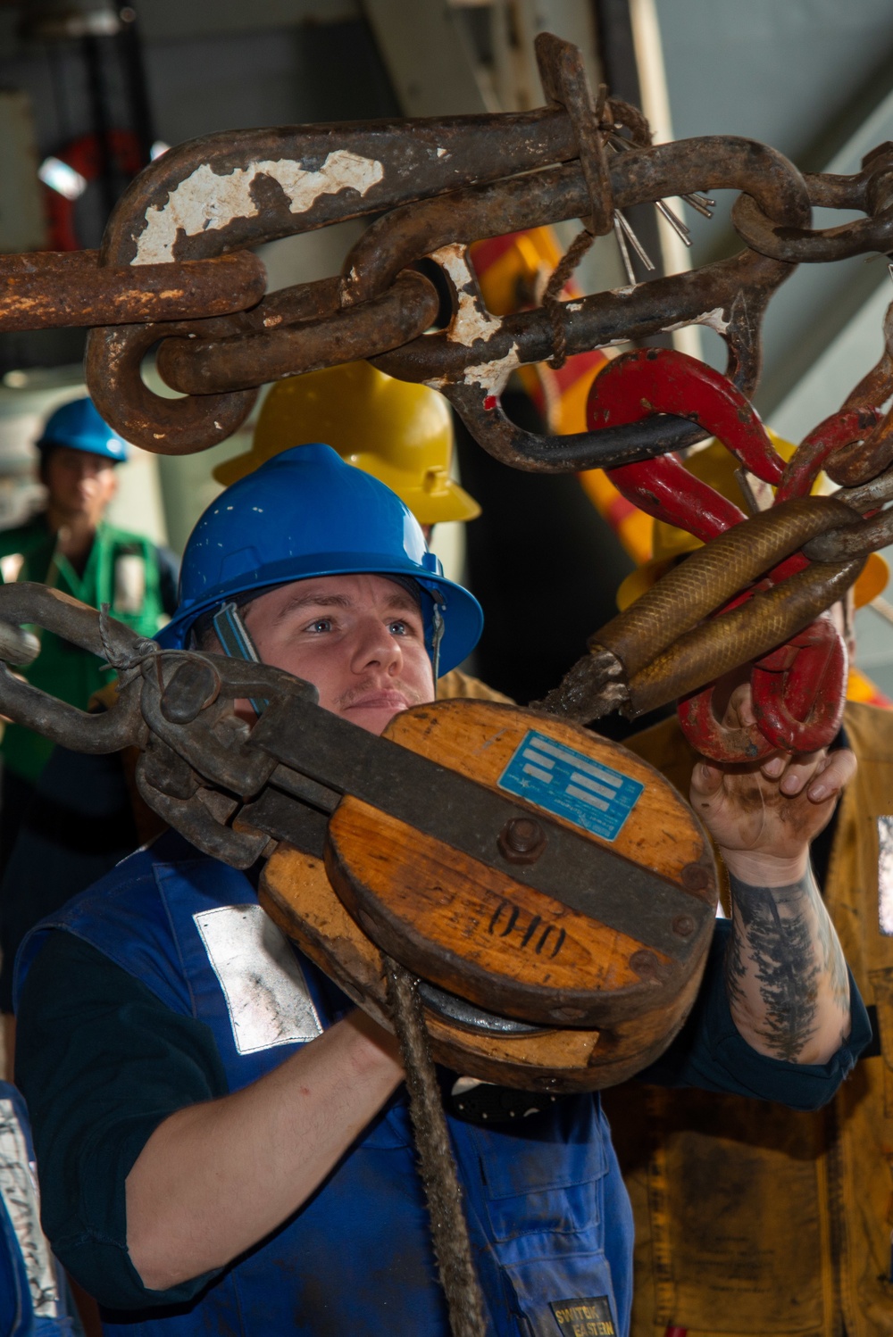 Sailor Checks Surf Hook Connection