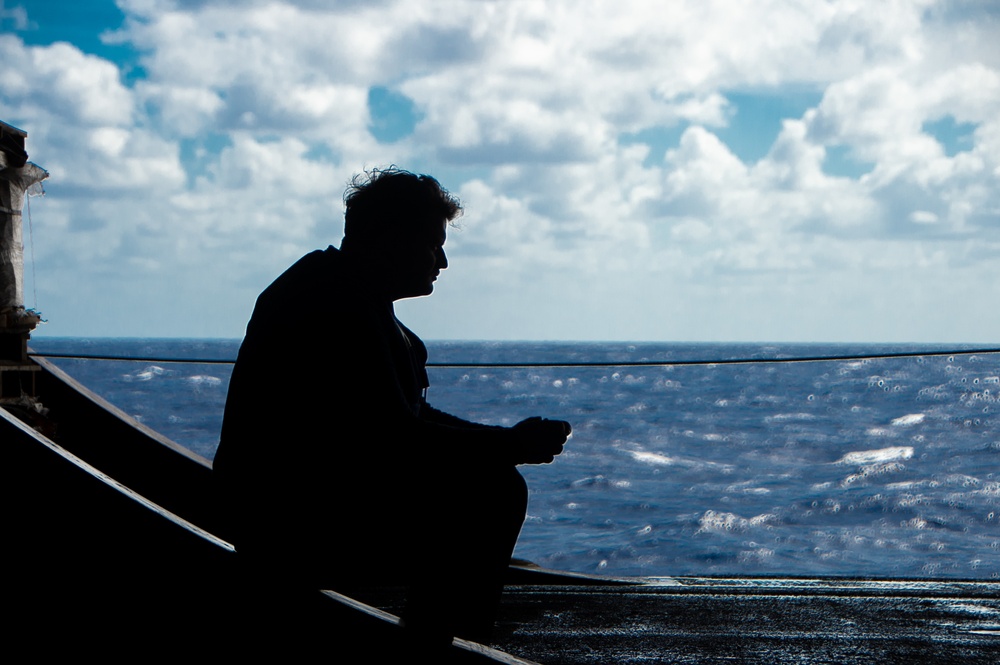 Sailor Waits To Move Jets