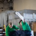 U.S. Navy Sailors Clean Padeyes