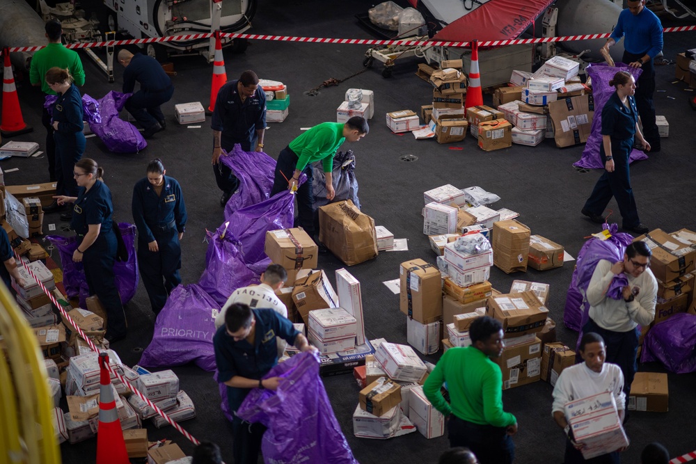 U.S. Navy Sailors Sort Mail