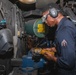 U.S. Sailor Grinds Metal