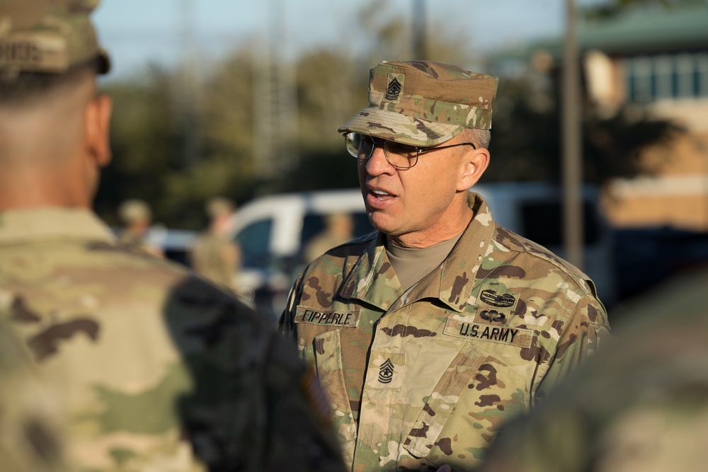 U.S. Army Reserve Soldiers report to the 143d Expeditionary Sustainment Command headquarters