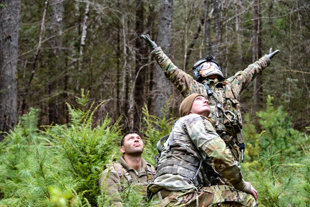 Tennessee National Guard medic signals for a lift in joint exercise