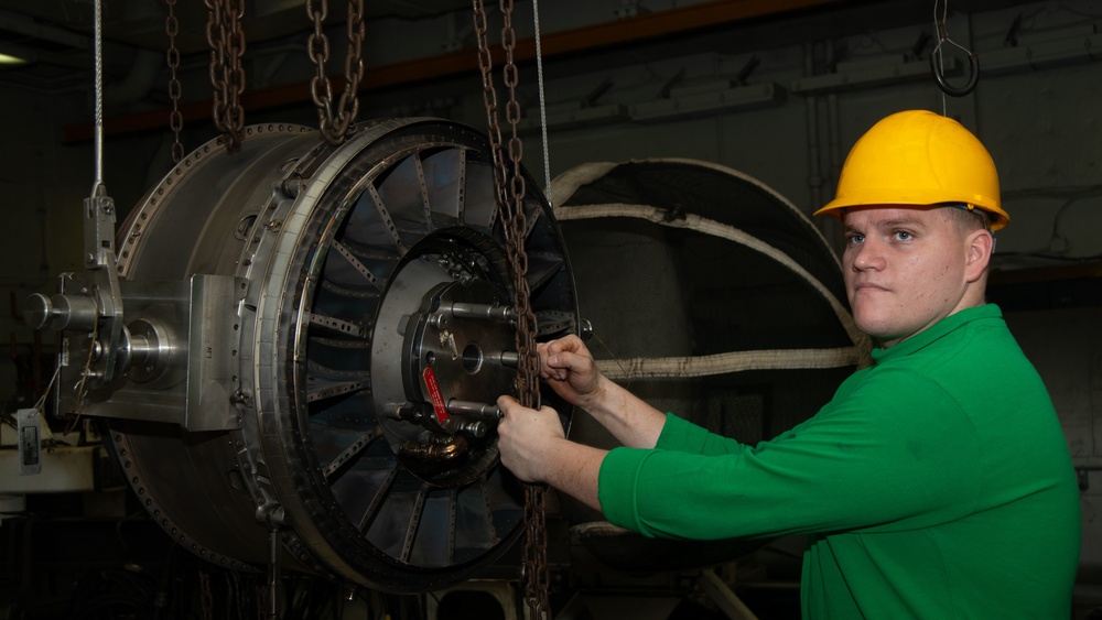 Sailor Removes Turbine From Engine