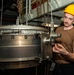 Sailor Removes Gain Drain Lines From Jet Engine