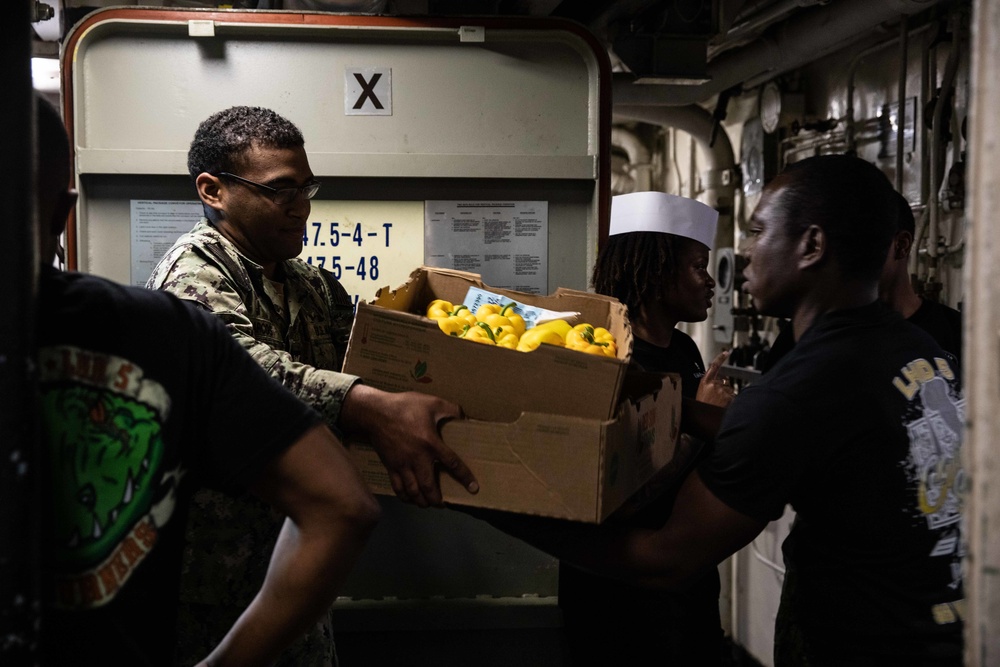 230104-N-AG075 USS BATAAN SAILORS PERFORM DAILY TASKS