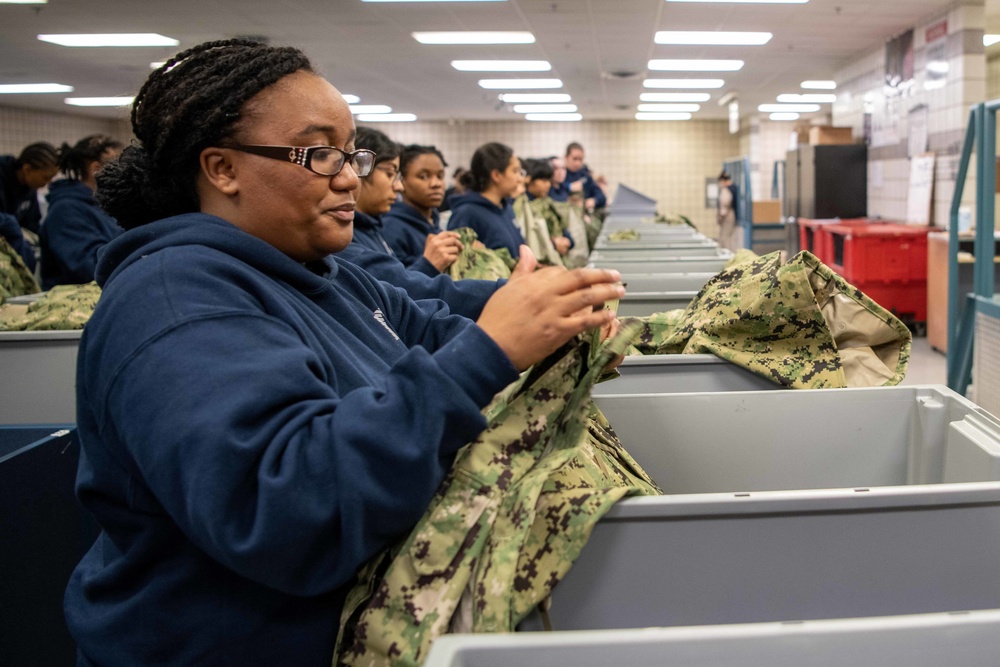 U.S. Navy recruits receive uniforms