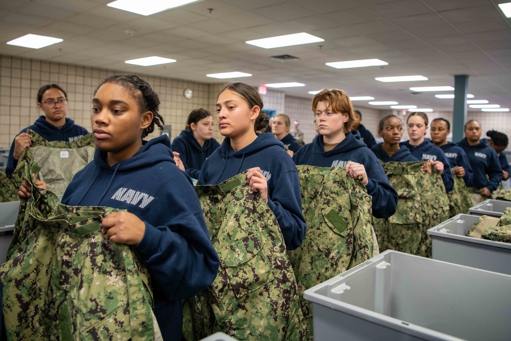 U.S. Navy recruits receive uniforms