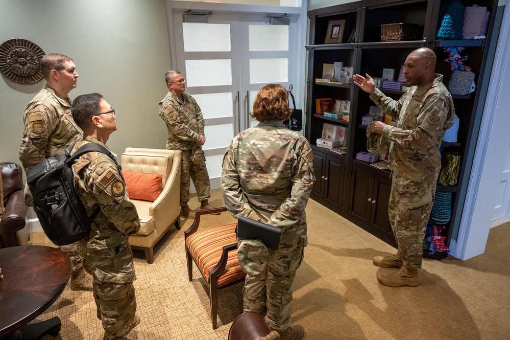 Chaplain (Maj. Gen.) Randall Kitchens and Chief Master Sgt. Sadie Chambers visit Air Force Mortuary Affairs Operations