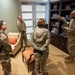 Chaplain (Maj. Gen.) Randall Kitchens and Chief Master Sgt. Sadie Chambers visit Air Force Mortuary Affairs Operations