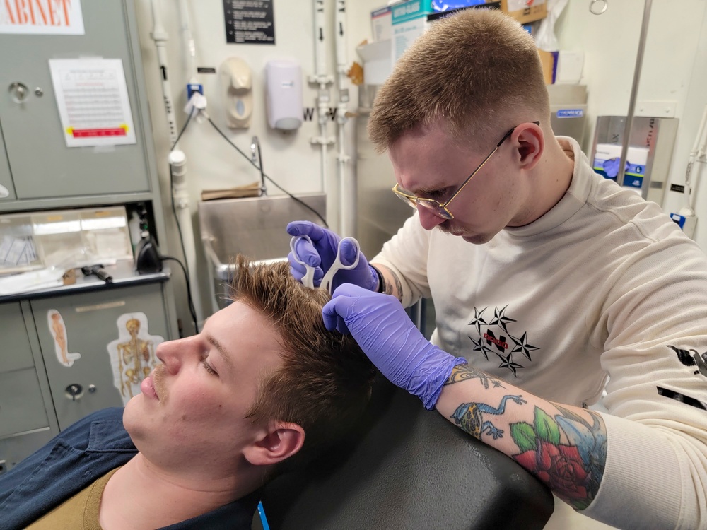 U.S. Navy Sailor Removes Medical Staples