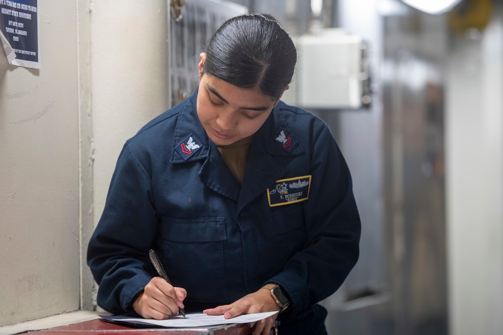 U.S. Navy Sailor Fills Out Medical Questionnaire