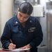 U.S. Navy Sailor Fills Out Medical Questionnaire