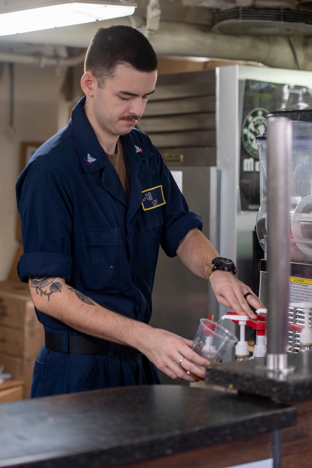 U.S. Navy Sailor Mixes Coffee