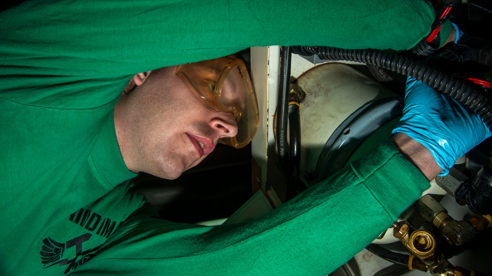 Sailor Replaces Hoses On Liquid Coolant Filtration Unit