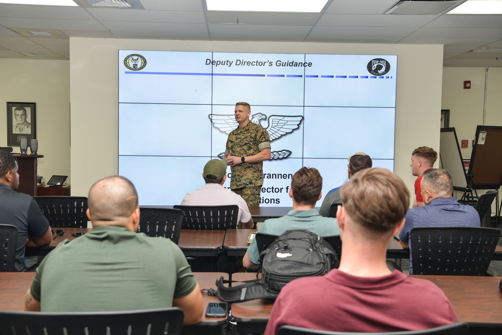 DPAA personnel receive pre-deployment brief
