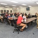 DPAA personnel receive pre-deployment brief