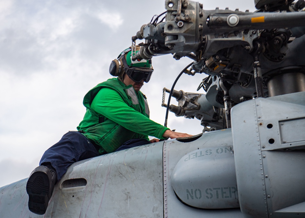 Sailor Performs Maintenance