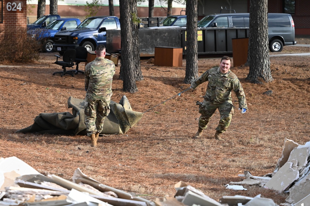 Team Little Rock Airmen Remove Storm Damaged Materials From Building