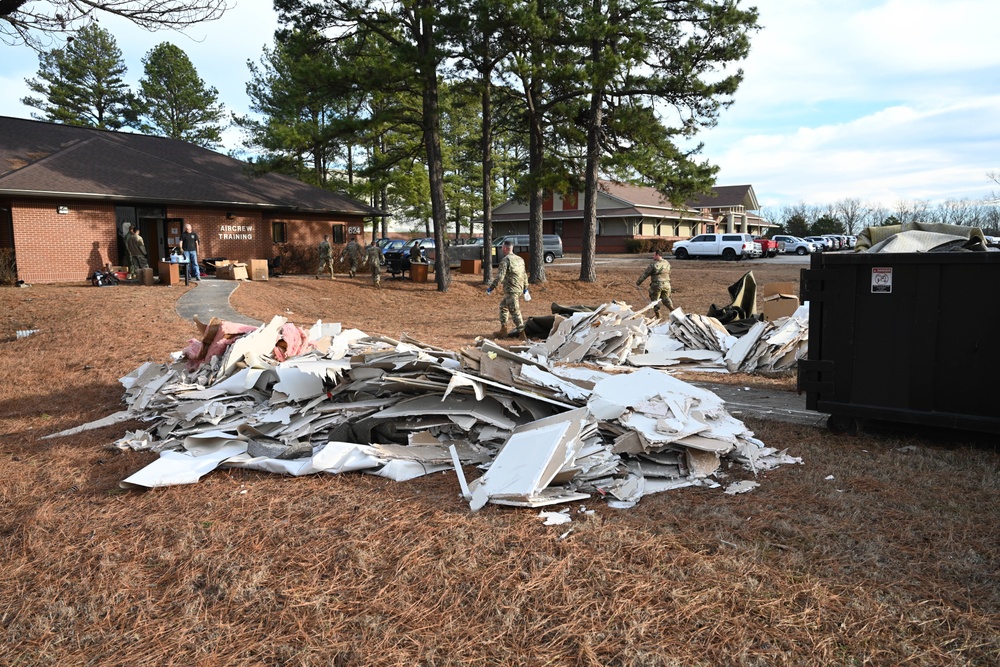 Team Little Rock Airmen Remove Storm Damaged Materials From Building