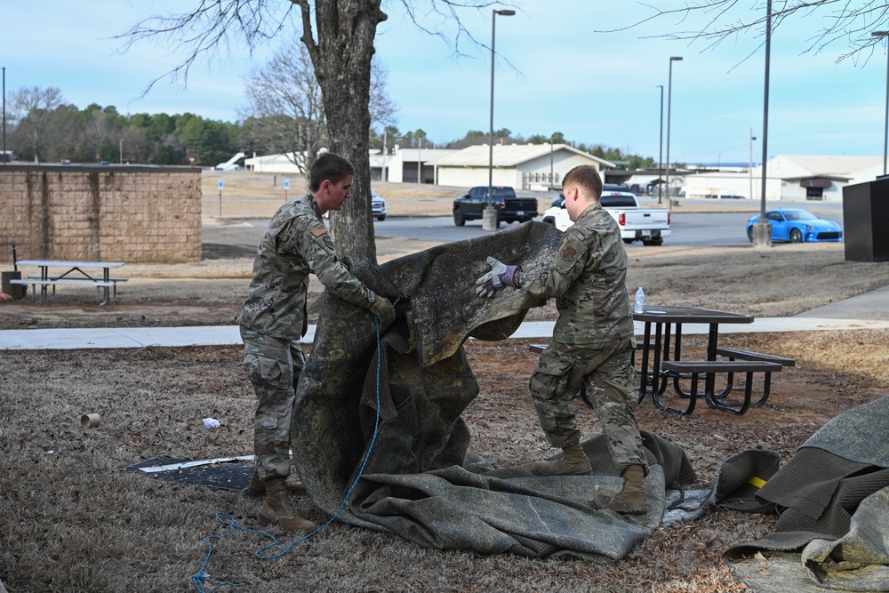 Team Little Rock Airmen Remove Storm Damaged Materials From Building