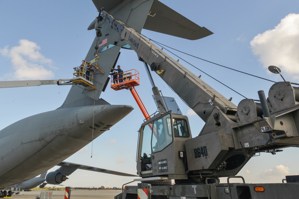 NMCB 11 Crane Operators work with 436th Maintenance Squadron