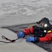 Firefighters on installation fire department dive team participate in ice rescue training at frozen lake at Fort McCoy